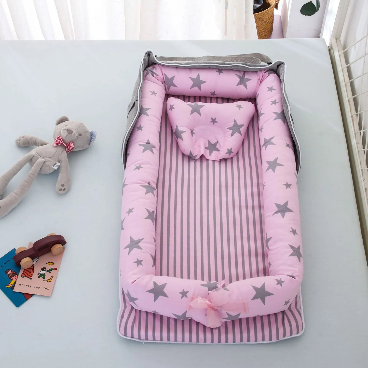 Lit bébé pliable,