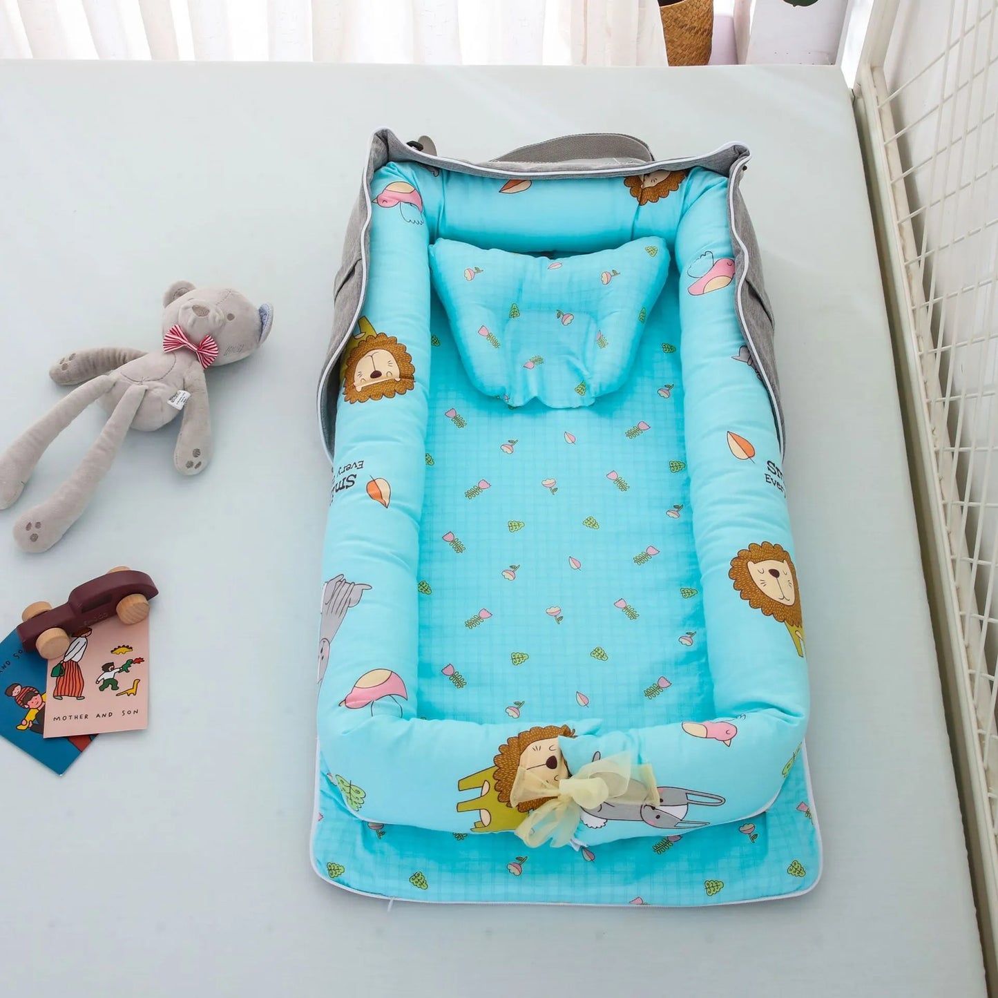 Lit bébé pliable,