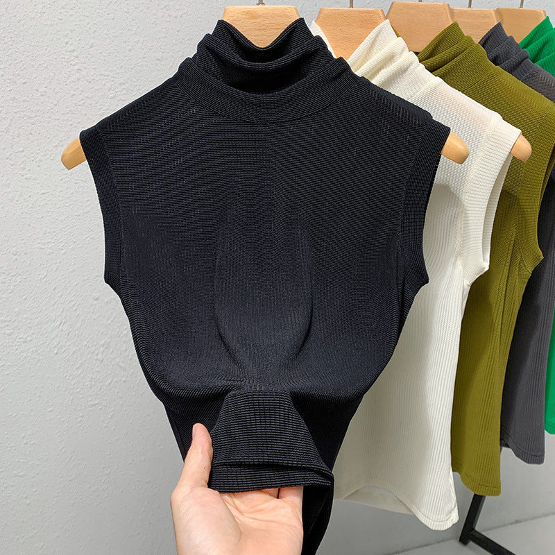 Blusa ajustada sin mangas con cuello alto y color granadina para mujer