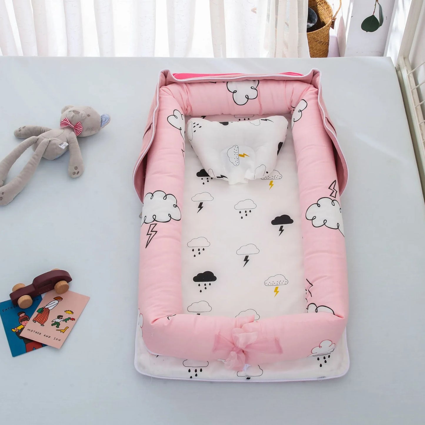 Lit bébé pliable,