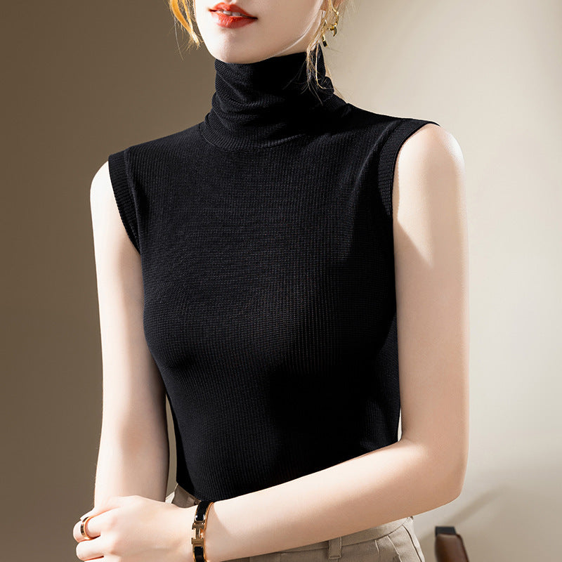 Blusa ajustada sin mangas con cuello alto y color granadina para mujer