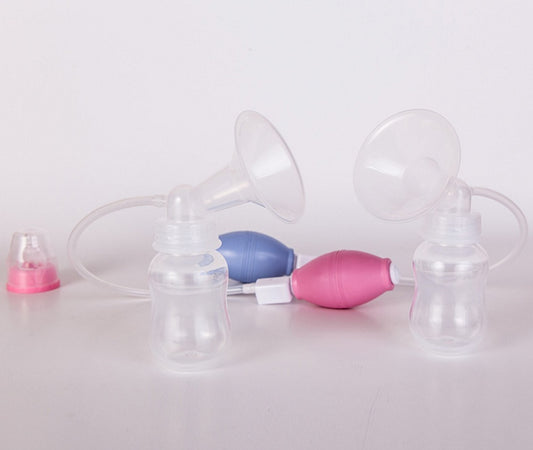 Women Feeding Manual Breast - Enfance-Heureuse