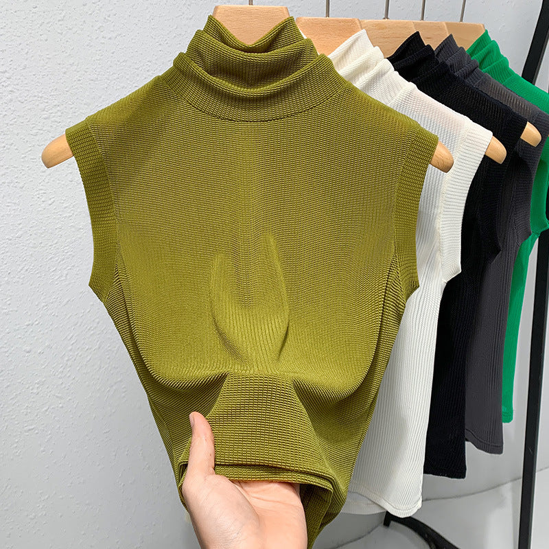 Blusa ajustada sin mangas con cuello alto y color granadina para mujer