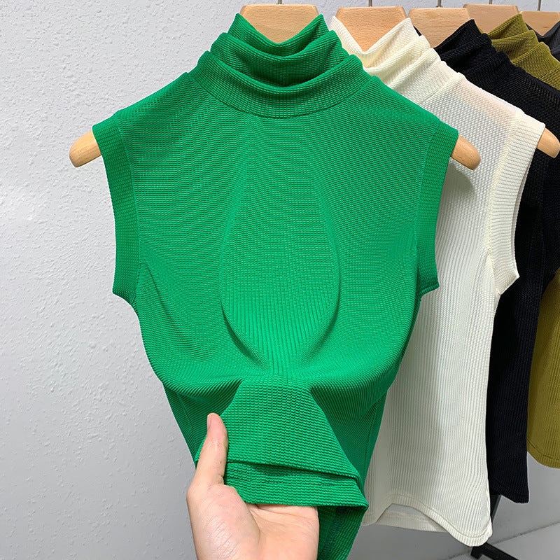 Blusa ajustada sin mangas con cuello alto y color granadina para mujer