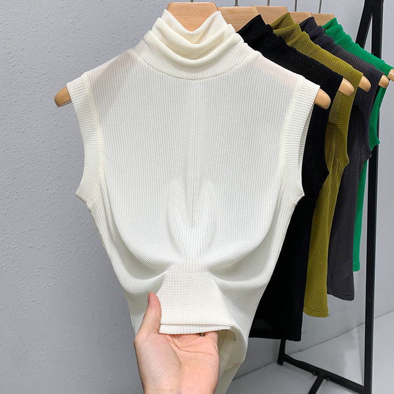 Blusa ajustada sin mangas con cuello alto y color granadina para mujer